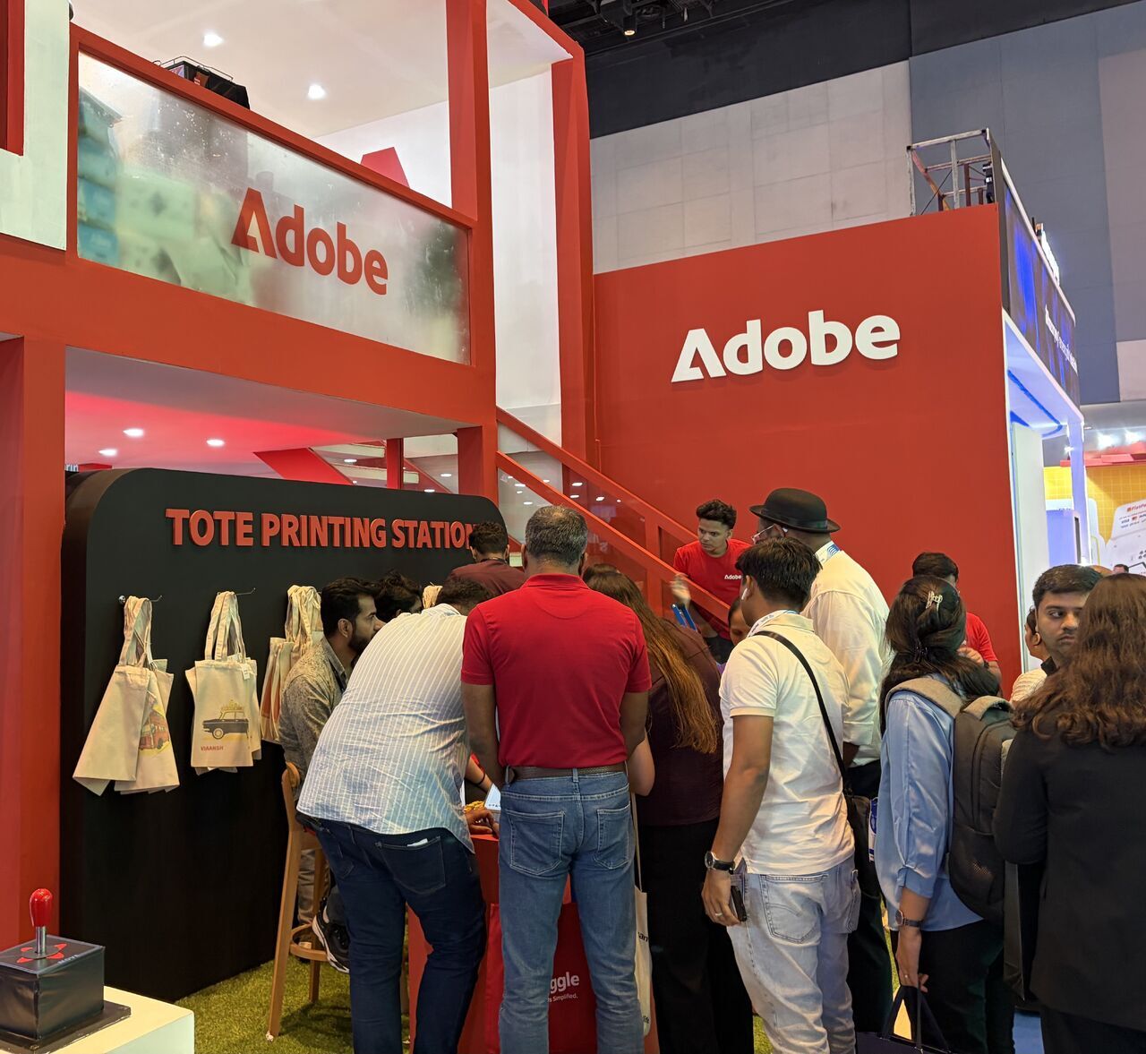 GFF 2025 booth - Adobe tote printing station